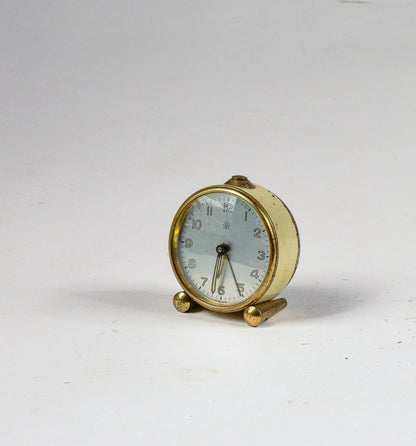 Sveglia in metallo cromato oro e panna vintage  Italia 1950