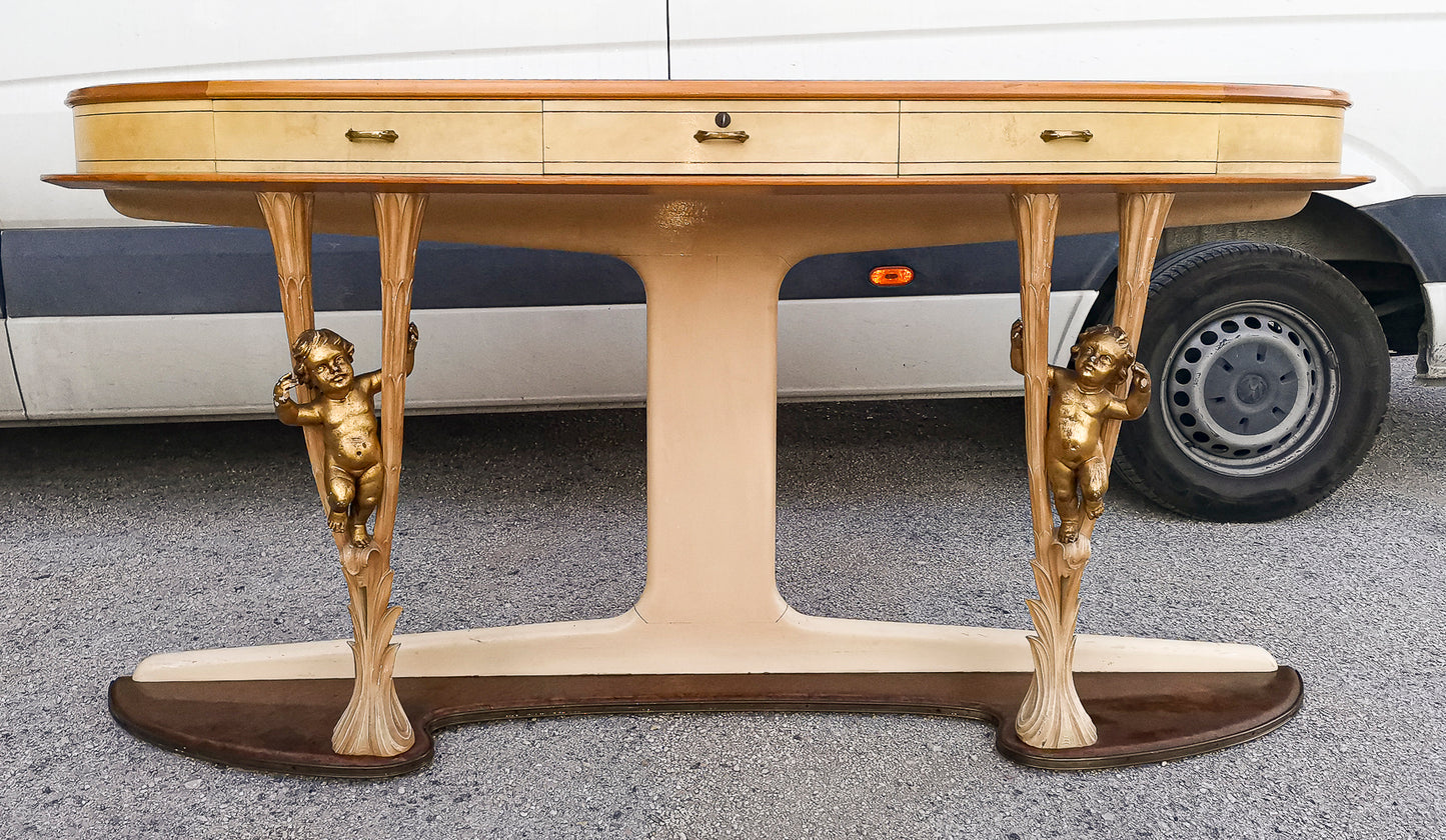 Consolle in pergamena e legno con  putti dorati e piano in vetro firmata Associazione Artigiani Canturini  Italia 1950