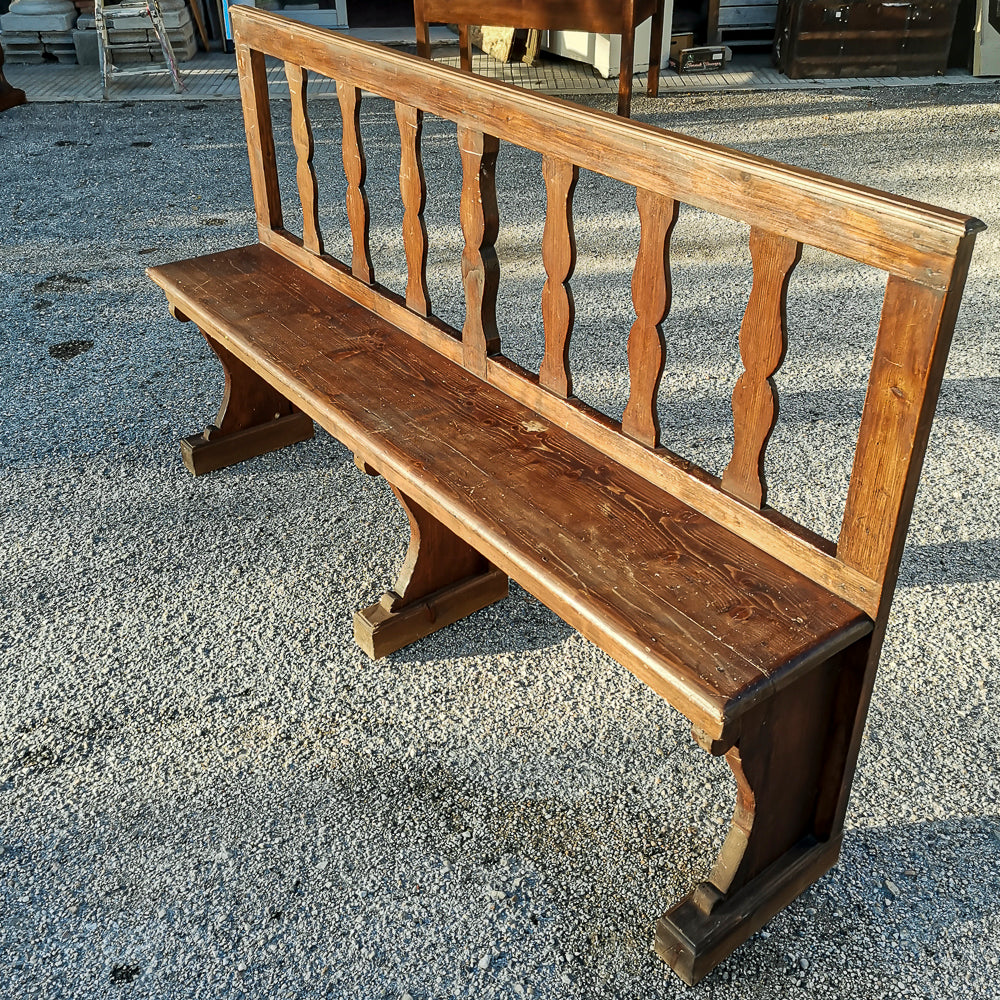 panca in legno con decori a colonna stilizzata primo 900