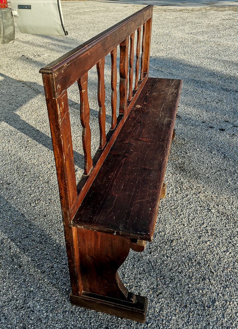 panca in legno con decori a colonna stilizzata primo 900