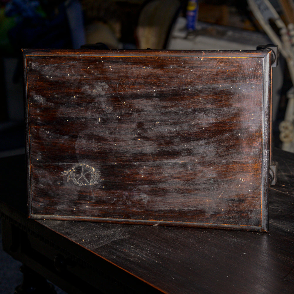 Tavolino basso in legno tinto ebano con cassetto e piedi torniti Italia 1930