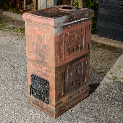 Stufa in terracotta marcata Becchi Forli Italia epoca Liberty