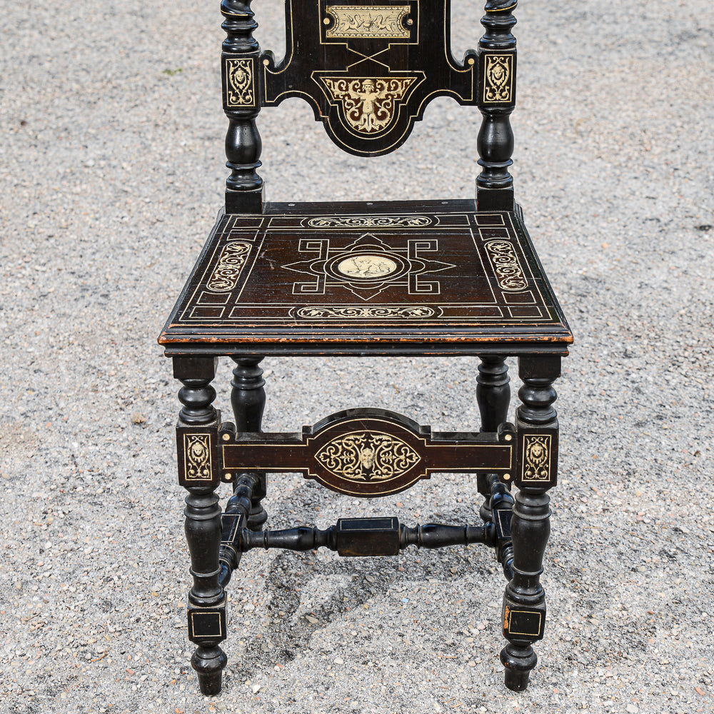 Sedia tinta ebano  intarsiata  con decori a rilievo stile  Pogliani epoca fine 800