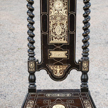 Sedia tinta ebano  intarsiata  con decori a rilievo stile  Pogliani epoca fine 800