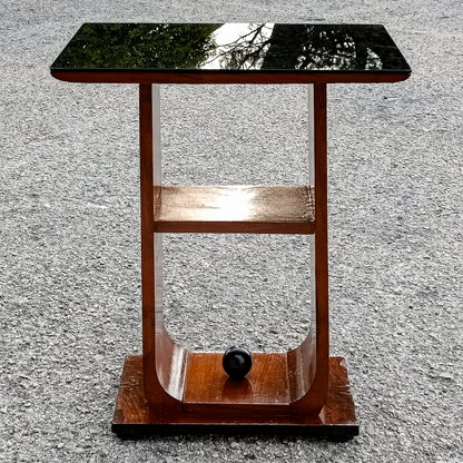 tavolino da fumo piano in vetro e decoro a sfera