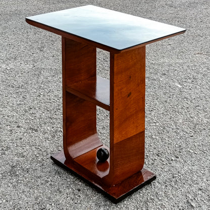 tavolino da fumo piano in vetro e decoro a sfera