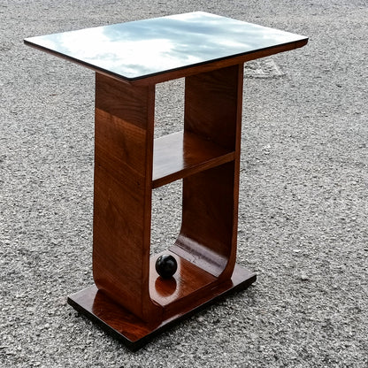 tavolino da fumo piano in vetro e decoro a sfera