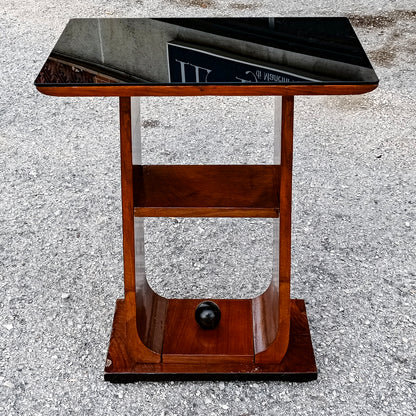 tavolino da fumo piano in vetro e decoro a sfera