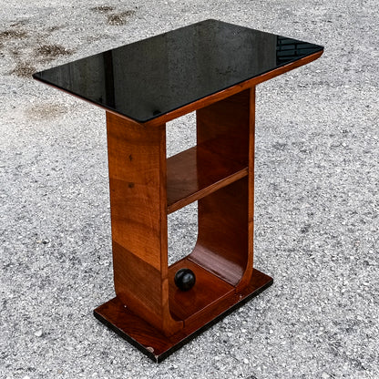 tavolino da fumo piano in vetro e decoro a sfera