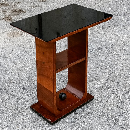 tavolino da fumo piano in vetro e decoro a sfera
