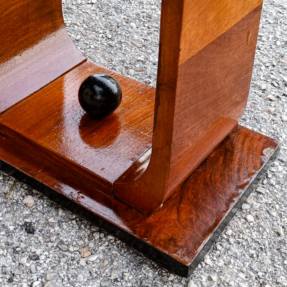 tavolino da fumo piano in vetro e decoro a sfera