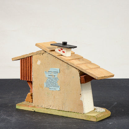 barometro a forma di casa con personaggi mobili