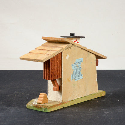 barometro a forma di casa con personaggi mobili