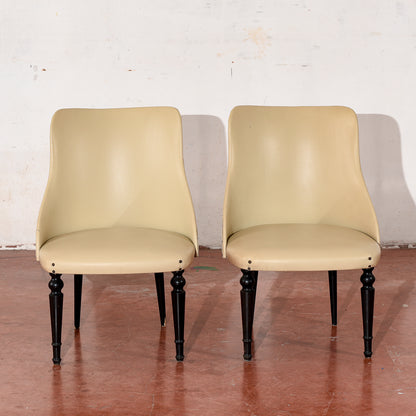 coppia di poltroncine rivestite in similpelle vintage design in stile Amedeo Cassina