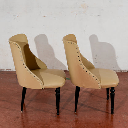 coppia di poltroncine rivestite in similpelle vintage design in stile Amedeo Cassina