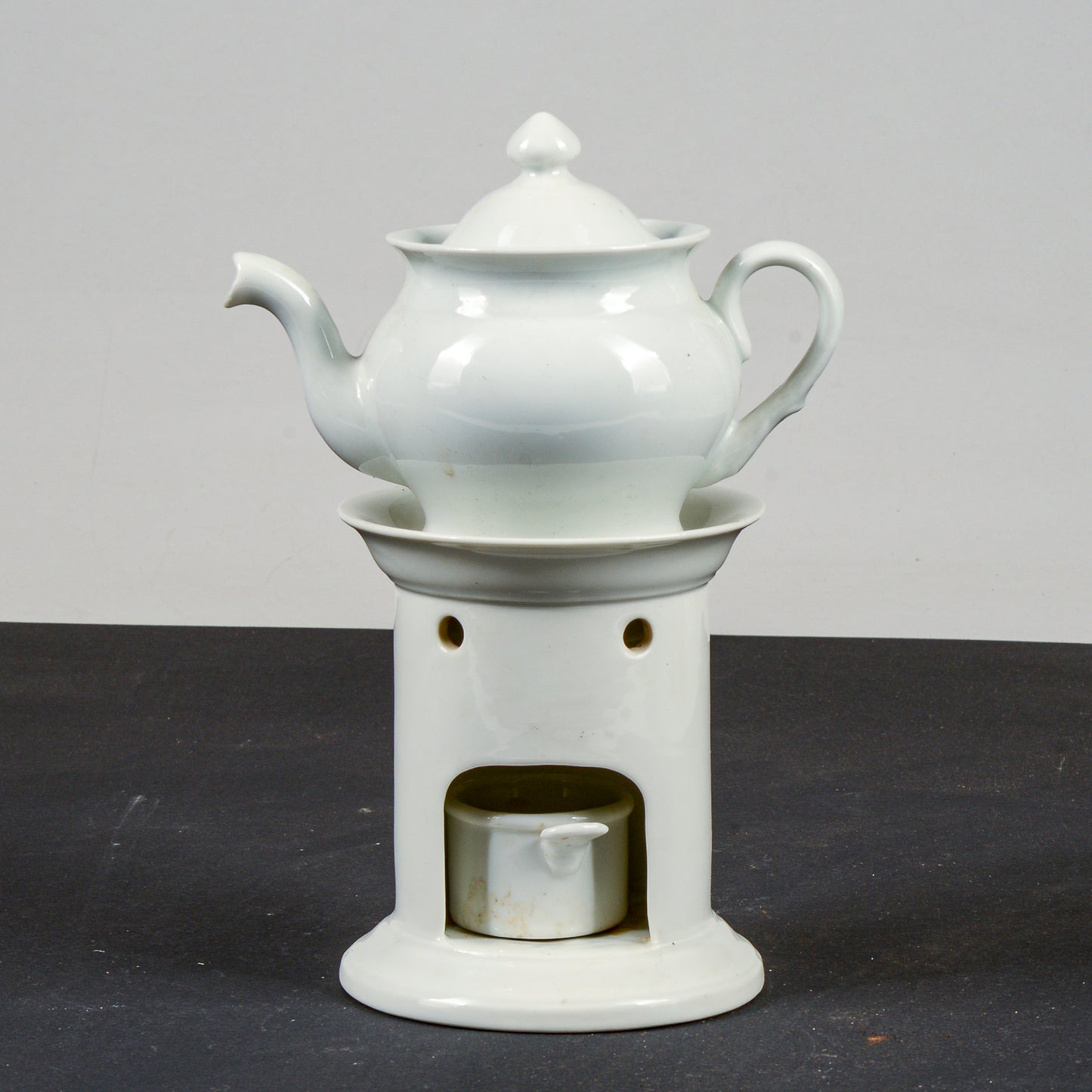 teiera ceramica bianca Richard Ginori con base e porta candela