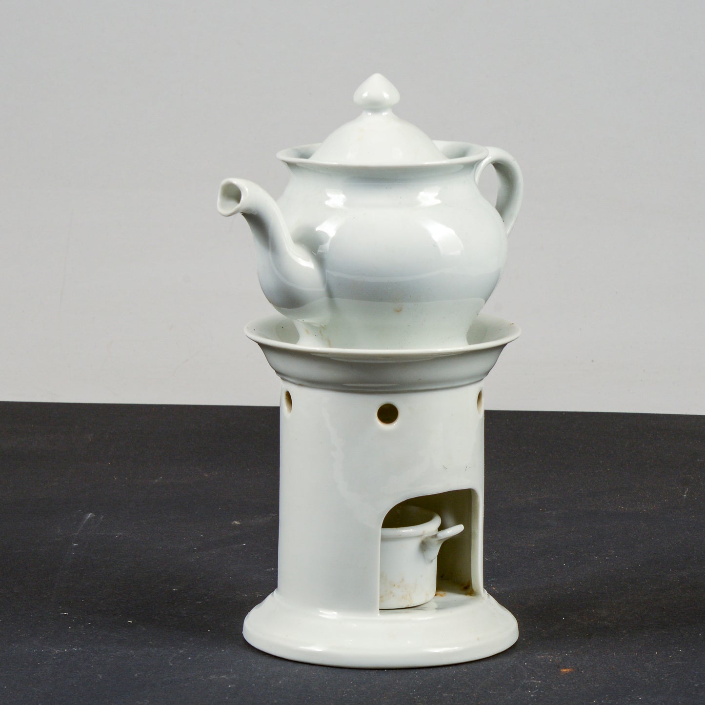 teiera ceramica bianca Richard Ginori con base e porta candela