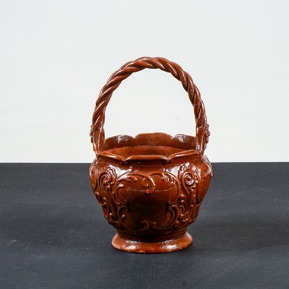 vaso smaltato in terracotta con manico intrecciato