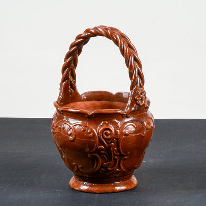 vaso smaltato in terracotta con manico intrecciato