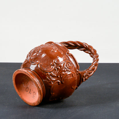 vaso smaltato in terracotta con manico intrecciato