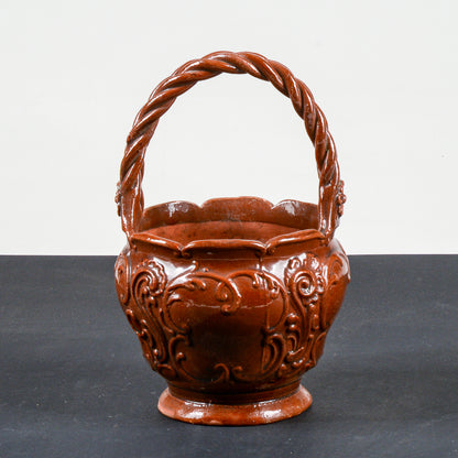 vaso smaltato in terracotta con manico intrecciato