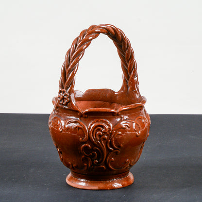 vaso smaltato in terracotta con manico intrecciato