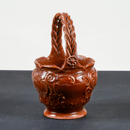 vaso smaltato in terracotta con manico intrecciato