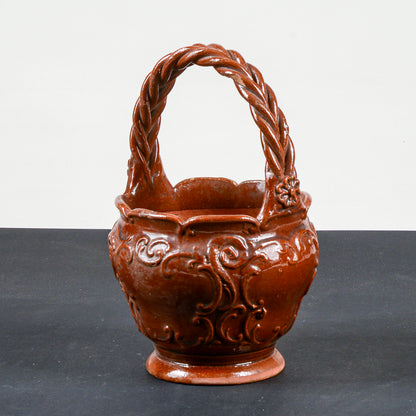 vaso smaltato in terracotta con manico intrecciato