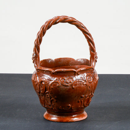 vaso smaltato in terracotta con manico intrecciato