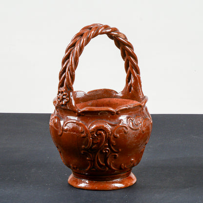 vaso smaltato in terracotta con manico intrecciato