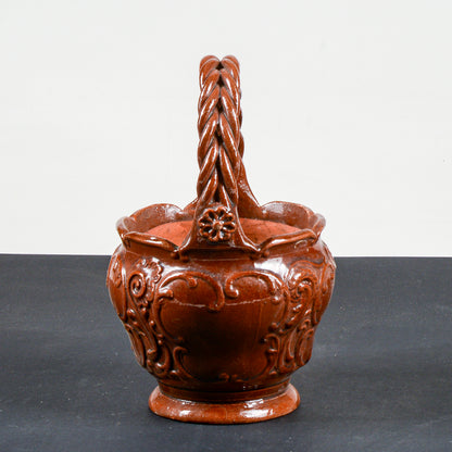 vaso smaltato in terracotta con manico intrecciato