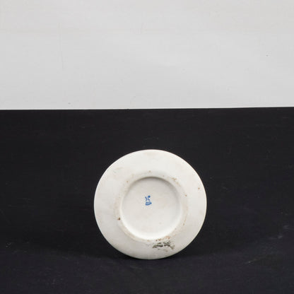 brocca decorativa in ceramica con parti smaltate