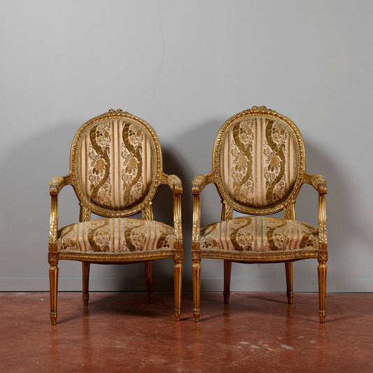 Coppia di poltrone dorate stile Napoleone III