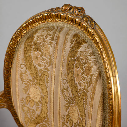 Coppia di poltrone dorate stile Napoleone III