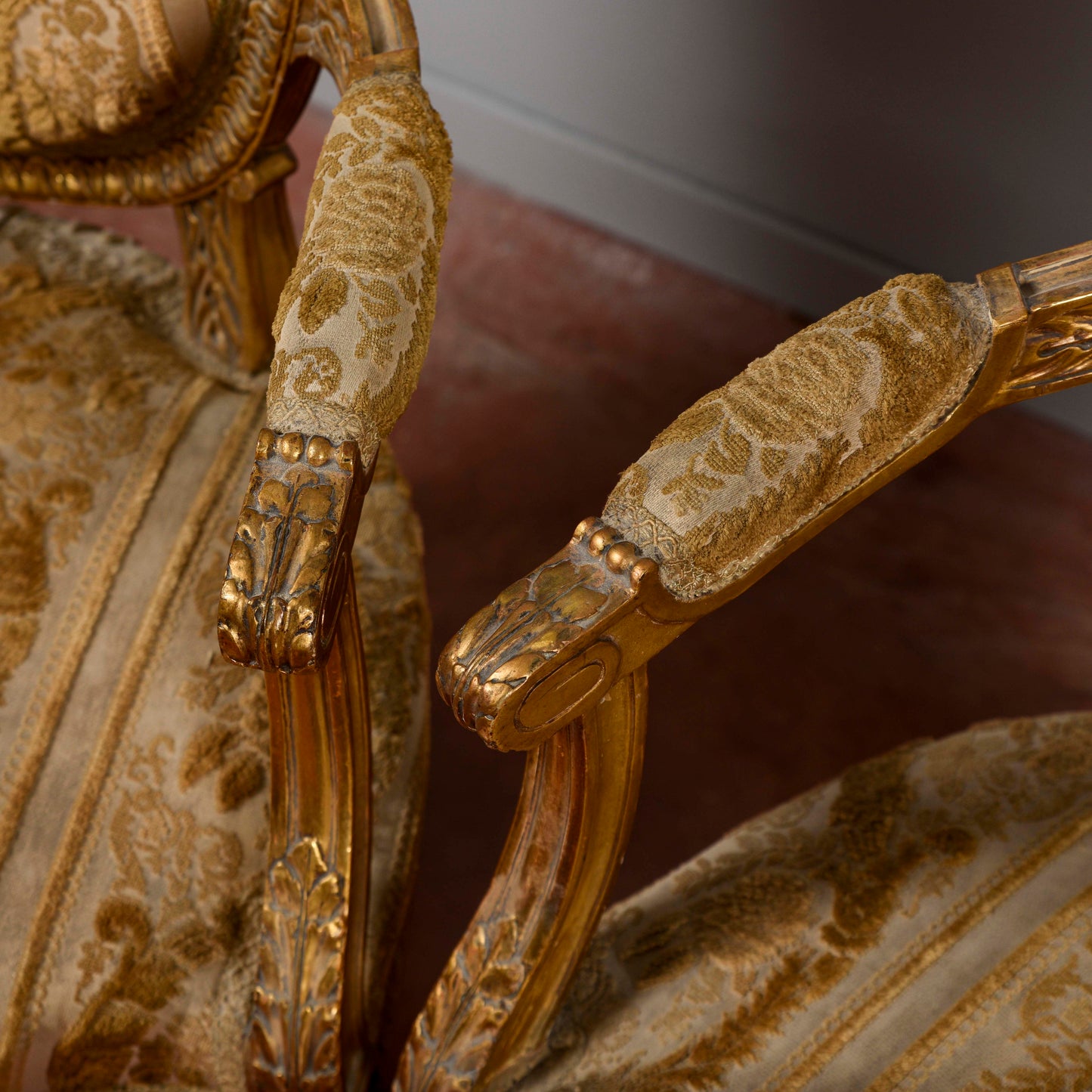 Coppia di poltrone dorate stile Napoleone III