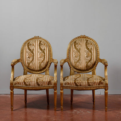 Coppia di poltrone dorate stile Napoleone III