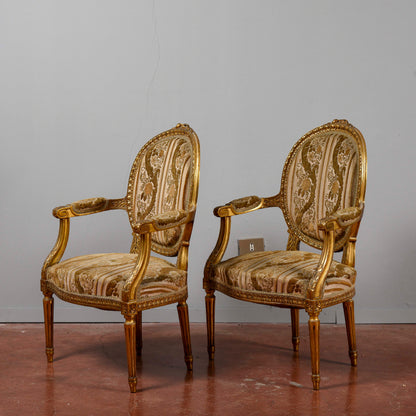 Coppia di poltrone dorate stile Napoleone III