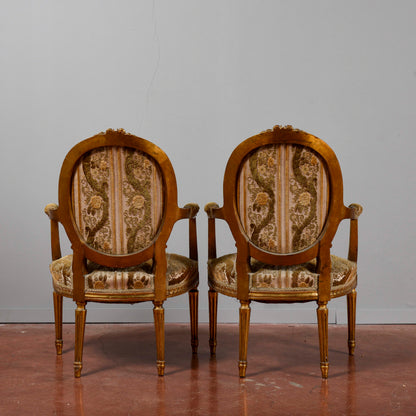 Coppia di poltrone dorate stile Napoleone III