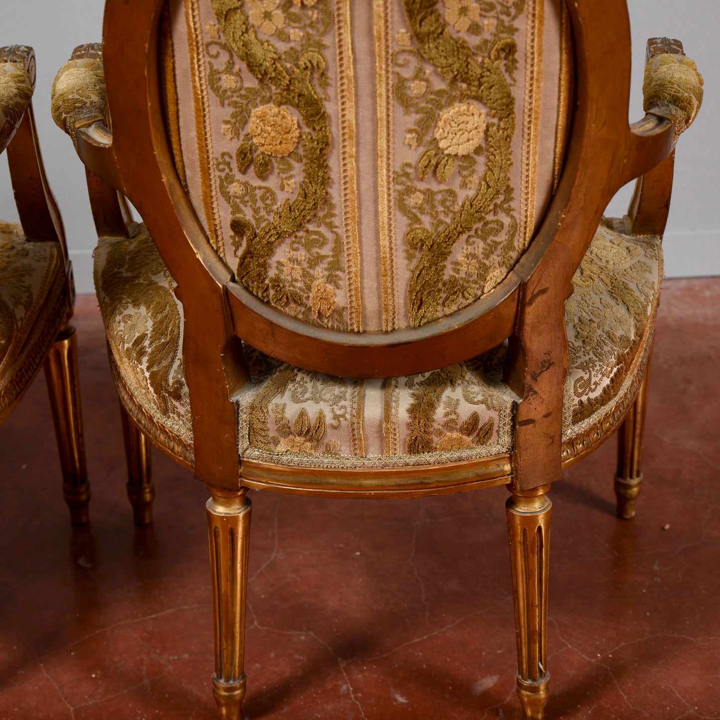 Coppia di poltrone dorate stile Napoleone III
