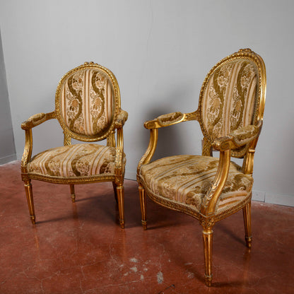 Coppia di poltrone dorate stile Napoleone III