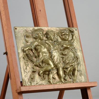 placca fusione ottone putti con musici danzanti