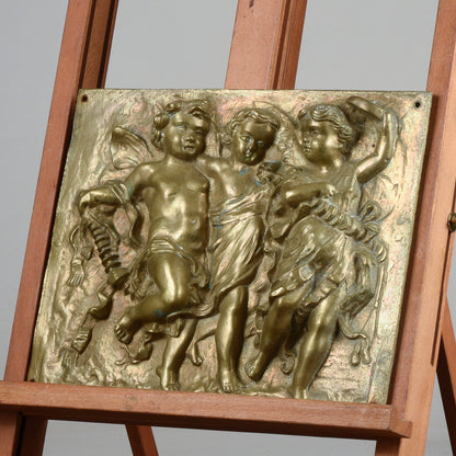 placca fusione ottone putti con musici danzanti