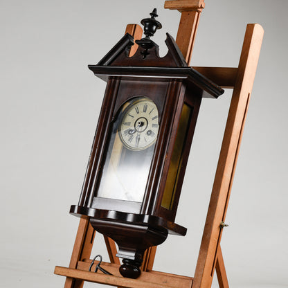 Orologio a pendolo da parete in legno con pendolo e chiave di carica