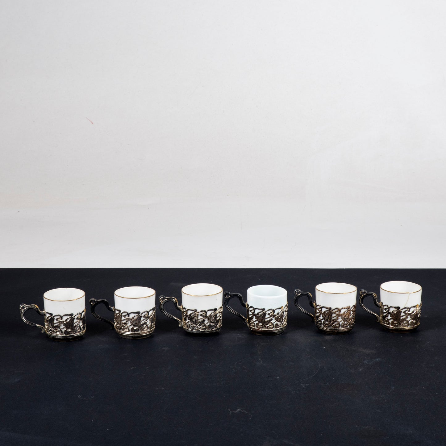 Set sei tazzine da caffè  in ceramica e  metallo  epoca liberty