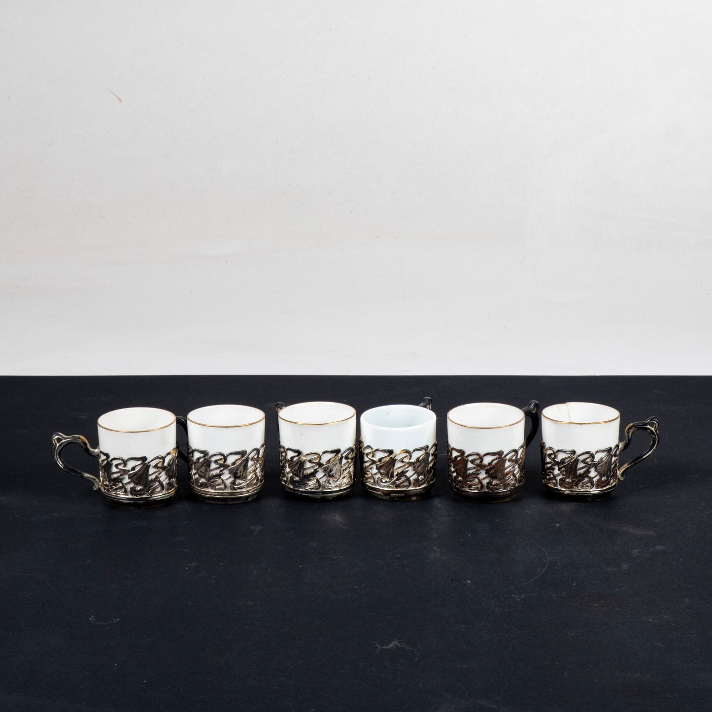 Set sei tazzine da caffè  in ceramica e  metallo  epoca liberty
