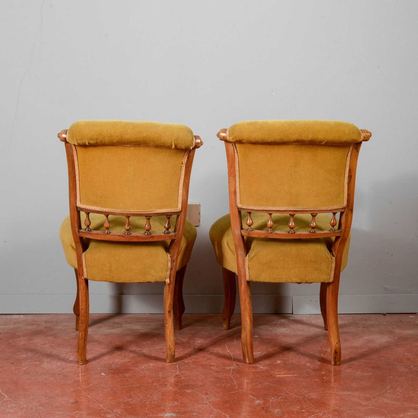 Coppia poltroncine  in noce rivestite in velluto fine secolo XIX