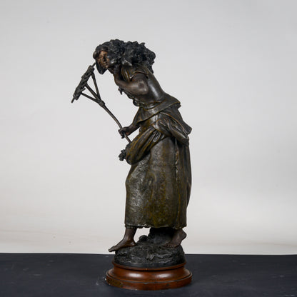 Scultura in metallo firmata Auguste Moreau Faneuse  la mietritrice