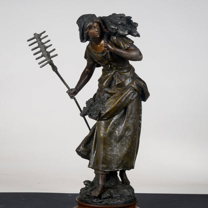 Scultura in metallo firmata Auguste Moreau Faneuse  la mietritrice