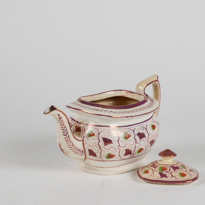 Teiera in ceramica smaltata finitura a lustro XX secolo