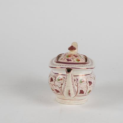 Teiera in ceramica smaltata finitura a lustro XX secolo